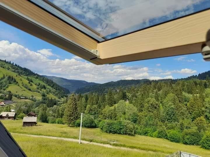The Rarău hills seen through the skylight
